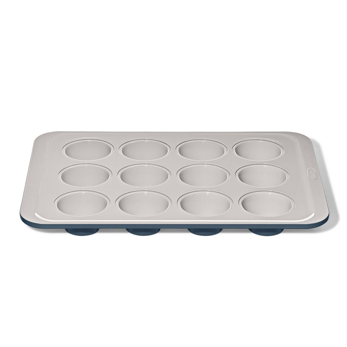 non-stick-pro-ceramic-coated-metal-bakeware-12-cup-muffin-pan-storm-blue-l7 oxo_12-cup-muffin-pan-stormblue_apdp_00_main.jpg